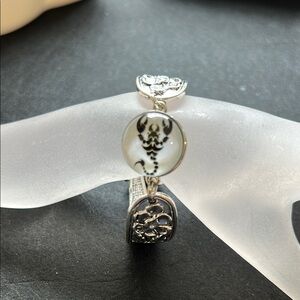 Elegant Silver and Black Bracelet with a zodiac scorpion 18mm snap button.